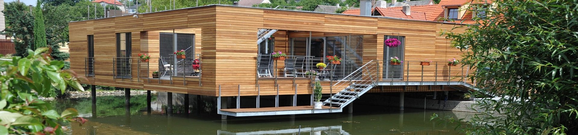 Green Facades: Integrating Timber Cladding and Vertical Gardens for Sustainable Architecture